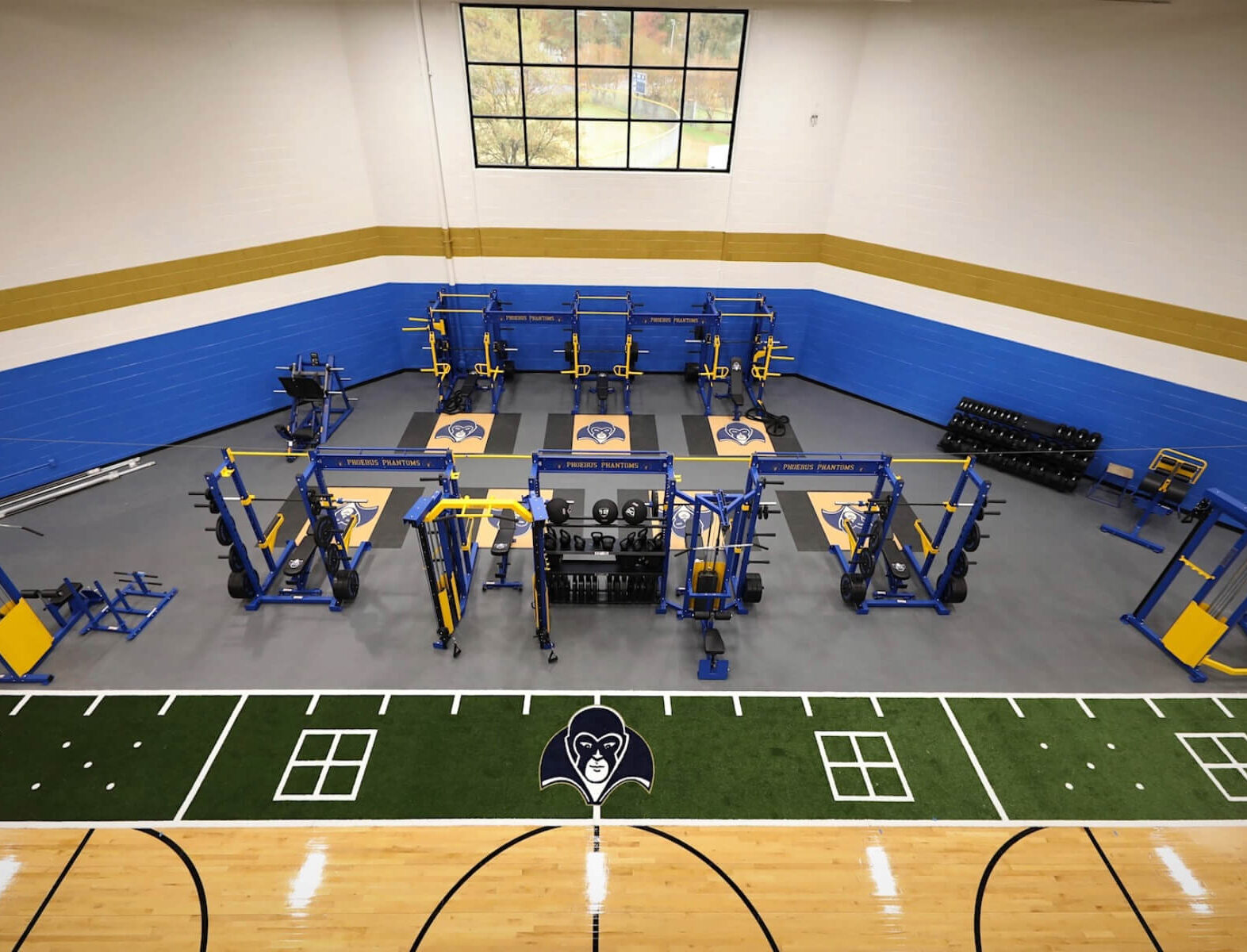 Phoebus High School Fitness Center with functional training turf and weightlifting equipment